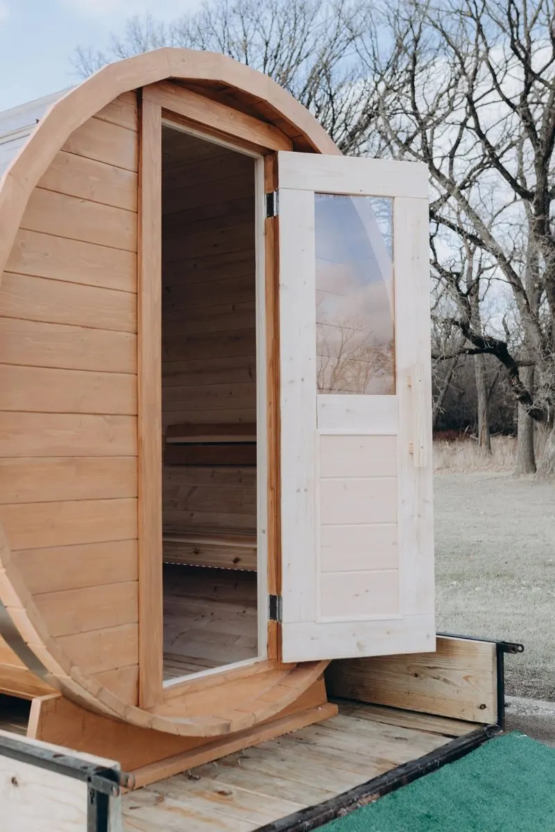 Sauna door detail with cedar benches inside
